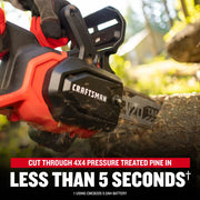 Photo of Craftsman cordless chainsaw CMCCS630P1 cutting tree branch outdoors, close-up side angle.