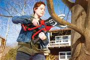 Photo of person using a Craftsman CMCCSL621D1 cordless lopper to cut a tree branch outdoors.