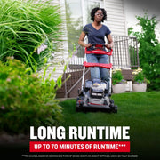 Photo of Craftsman CMCMWSP320X2 lawn mower in use on grass lawn, showing red and black body, outdoor setting.