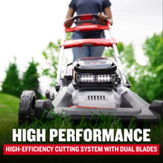 Photo of CRAFTSMAN CMCMWSP320X2 lawn mower in use, showing LED lights and dual-blade cutting system outdoors.