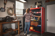 Photo of Craftsman CMST24800RB red storage cabinet in garage, open doors revealing organized tools and supplies.