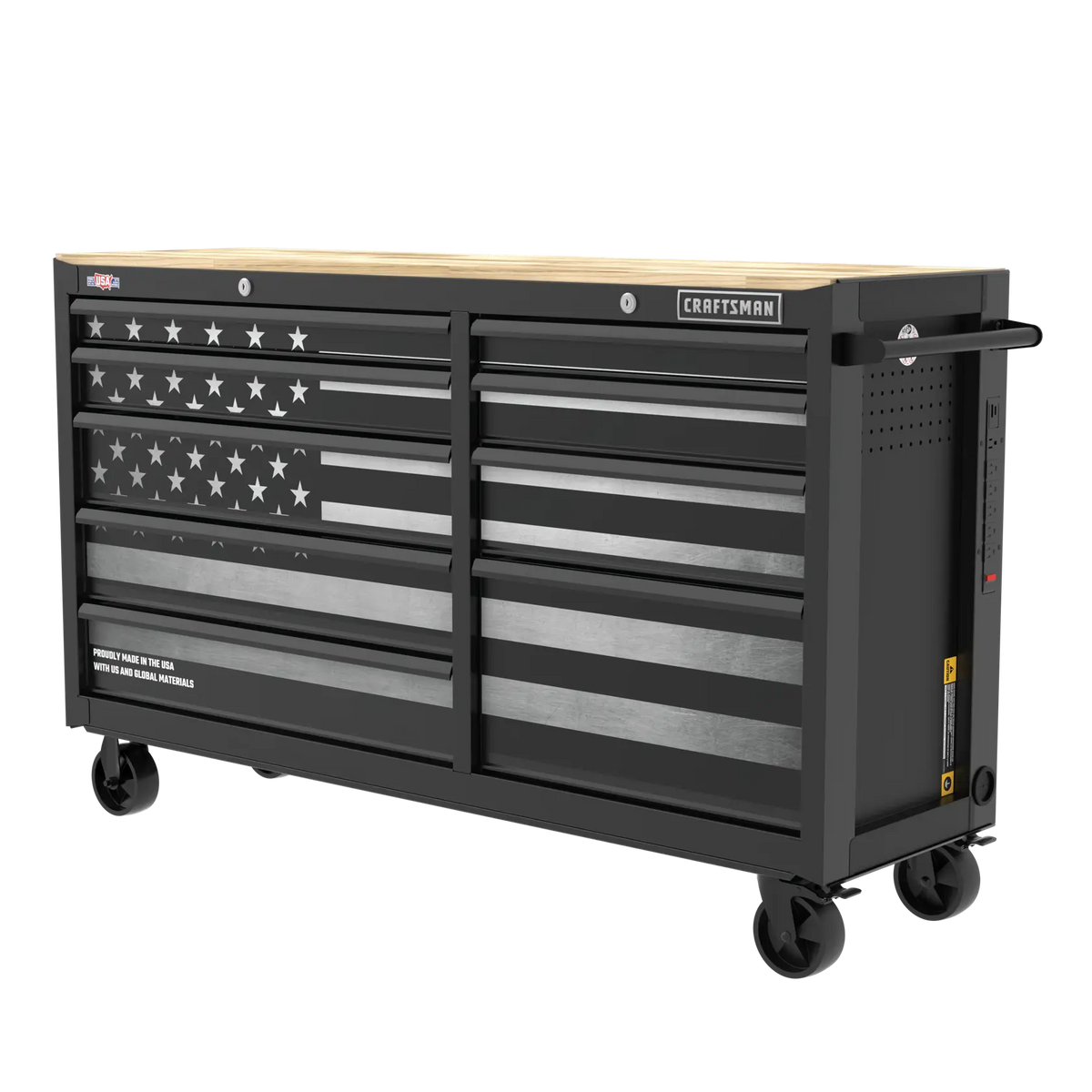 Large black rolling tool chest with multiple drawers, featuring an American flag design on the front and a light wood top. The chest is labeled with the brand name 'Craftsman' and has casters for mobility.