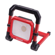 Photo of Craftsman LED work light CMXELAYMPL1026, red and black, angled view on white background.